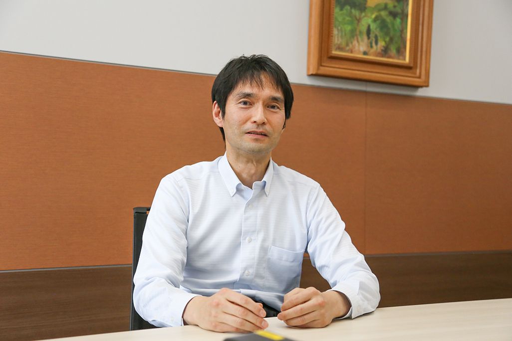 KDDI総合研究所・光部門 吉兼 昇