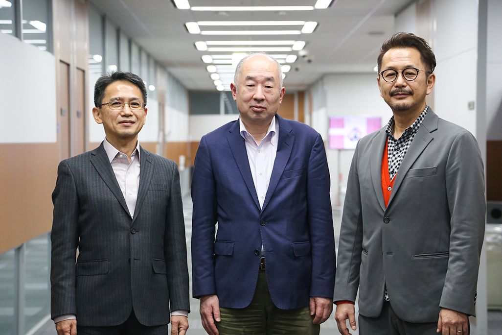 KDDI 技術統括本部の河合宣行、大谷 潤、橋本高志